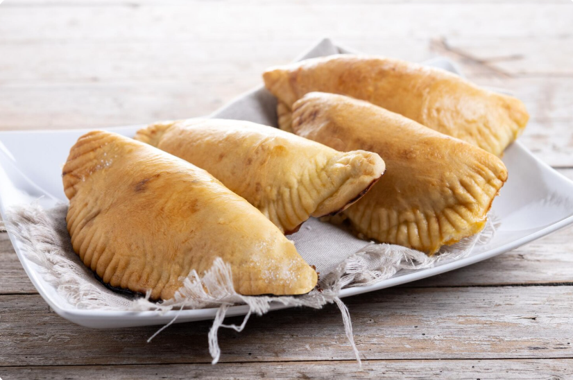 https://modofoods.com/public/storage/photos/1/Blog Pics/Where to Find the Best Empanadas in Houston.png